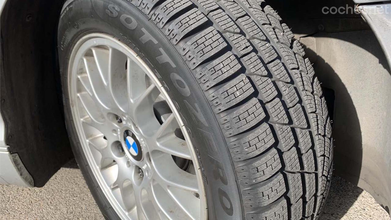 There is a wear indicator on the tread.  If the tire tread is less than the indicator, the tires must be changed.