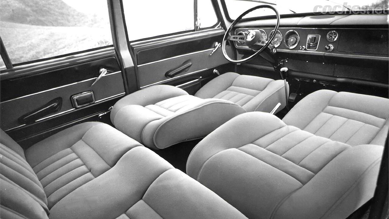 The passenger compartment of an Austin Victoria with the seats folding flat, another unusual feature at the time.