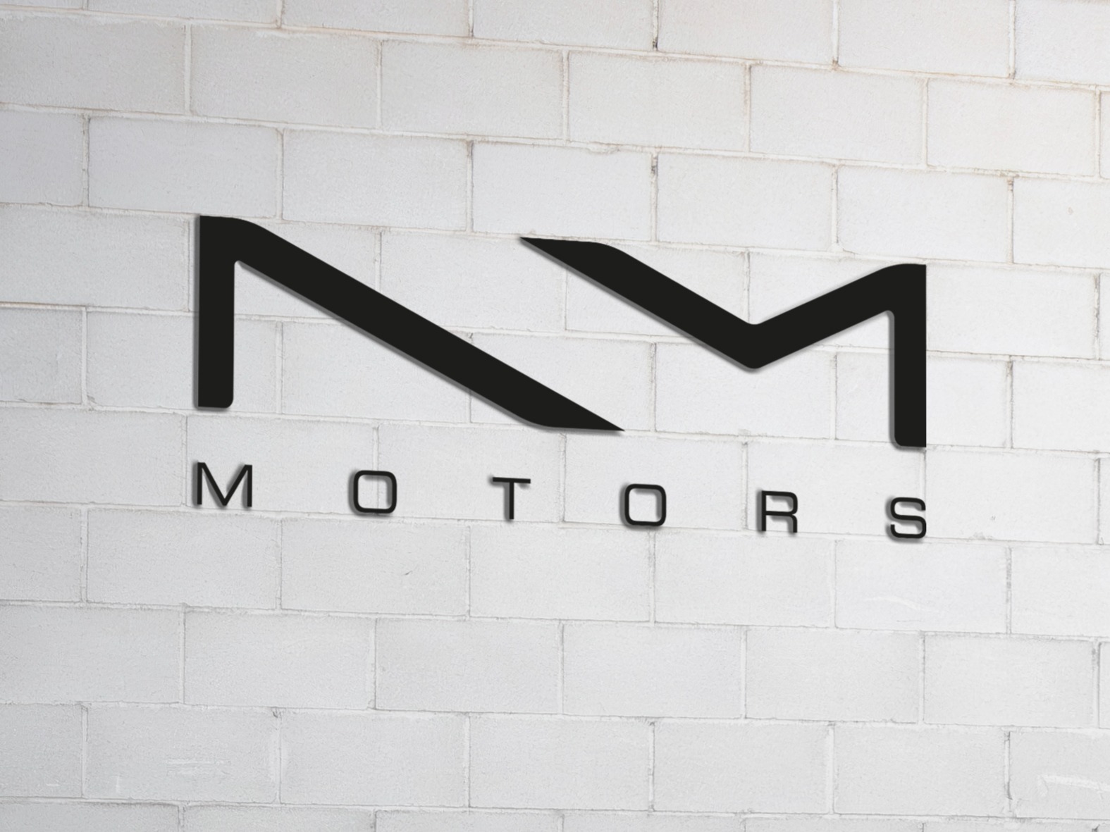 logo de NM motors